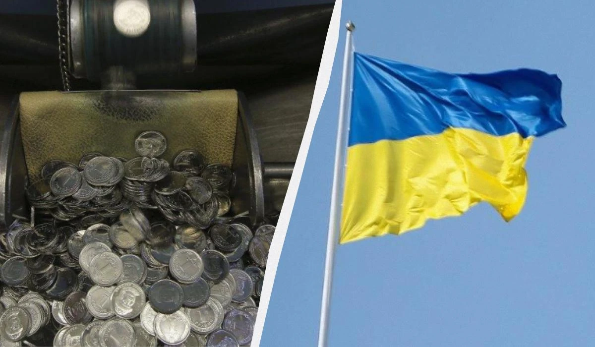 Срібна монета 20 гривень: рука військового зі щитом і дитячий малюнок-талісман на аверсі, пошкоджений щит на реверсі